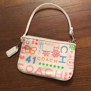 Authentic Spring Coach Wristlet